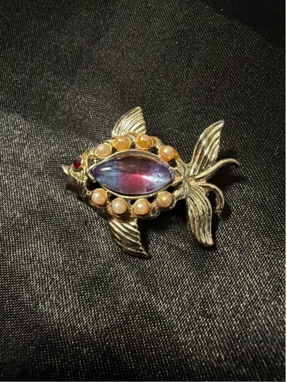 Gold-Tone Decorative Fish Ornament with Purple Center Stone